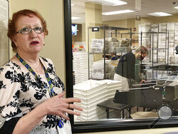 FILE— Clackamas County Elections Clerk Sherry Hall speaks at the office on Thursday, May 19, 2022, Oregon City, Ore. Ballots with blurry barcodes that can't be read by vote-counting machines are delaying election results by weeks in a key U.S. House race in Oregon's primary. Hall said the problem first came to light May 3, when elections workers put the first ballots returned in the vote-by-mail state through the vote-counting machine. (AP Photo/Gillian Flaccus, File)