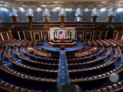 FILE - The chamber of the House of Representatives is seen at the Capitol in Washington, Feb. 28, 2022. The once-a-decade congressional redistricting cycle is ending in a draw. That means Republicans will maintain a modest advantage in the battle for control of the House of Representatives in the coming decade. (AP Photo/J. Scott Applewhite, File)