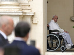 FILE - Pope Francis arrives on a wheelchair for an audience with children in the San Damaso courtyard at the Vatican, Saturday, June 4, 2022. Pope Francis added fuel to rumors about the future of his pontificate on Saturday by announcing he would visit the central Italian city of L'Aquila in August for a feast initiated by Pope Celestine V, one of the few pontiffs who resigned before Pope Benedict XVI stepped down in 2013. (AP Photo/Alessandra Tarantino, File)