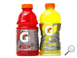 Bottles of Gatorade are pictured, left, a 32 fluid ounce and 28 fluid ounce, in Glenside, Pa., Monday, June 6, 2022. (AP Photo/Matt Rourke)