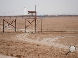 A general view of the dried up Lake Sawa Iraq, is seen Saturday, June 4, 2022. This year, for the first time in its centuries-long history, Sawa Lake dried up completely. A combination of mismanagement by local investors, government neglect and climate change has ground down its azure shores to chunks of salt. (AP Photo/Hadi Mizban)