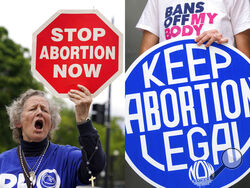 A woman holds a sign saying "stop abortion now," at a protest outside of the U.S. Supreme Court in Washington on May 5, 2022, left, and another woman holds a sign during a news conference for reproductive rights in response to the leaked draft of the Supreme Court's opinion to overturn Roe v. Wade, in West Hollywood, Calif., on March 3, 2022. For families divided along red house-blue house lines, summer's slate of reunions, group trips and weddings poses another exhausting round of navigating divides. The s