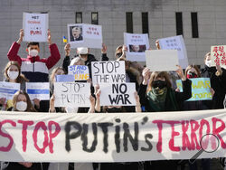 FILE - People protest at a rally calling for Russia to stop the war against Ukraine in Seoul, South Korea, March 5, 2022. Nuclear Russia's pillaging of non-nuclear Ukraine is rattling what's already a destabilizing moment in nuclear nonproliferation efforts. Some former leaders in Asia have cited the Ukraine conflict as evidence it's time for nations there to think about getting nukes of their own. (AP Photo/Ahn Young-joon, File)