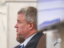 Attorney General Jason Ravnsborg listens from the defense table during his impeachment trial on Tuesday, June 21, 2022, at the South Dakota State Capitol in Pierre, S.D. (Erin Woodiel/The Argus Leader via AP)