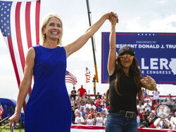 Rep. Mary Miller, R-Ill., left, is joined by Rep. Lauren Boebert, R-Colo., on stage at a rally at the Adams County Fairgrounds in Mendon, Ill., Saturday, June 25, 2022. (Mike Sorensen/Quincy Herald-Whig via AP)