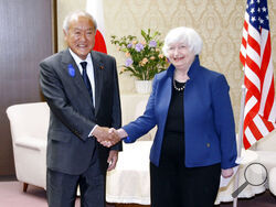 U.S. Treasury Secretary Janet Yellen, right, and Japan's Finance Minister Shunichi Suzuki shake hands during their meeting at the finance ministry in Tokyo, Tuesday, July 12, 2022. With thousands of sanctions already imposed on Russia to flatten its economy, the U.S. and its allies are working on new measures to starve the Russian war machine while also stopping the price of oil and gasoline from soaring to levels that could crush the global economy. (Kyodo News via AP)