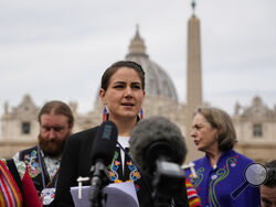 FILE - President of the Metis community, Cassidy Caron, speaks to the media in St. Peter's Square after their meeting with Pope Francis at The Vatican, Monday, March 28, 2022. The restitution of Indigenous and colonial-era artifacts, a pressing debate for museums and national collections across Europe, is one of the many agenda items awaiting Francis on his trip to Canada, which begins Sunday. (AP Photo/Gregorio Borgia, File )
