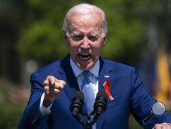 FILE - President Joe Biden speaks during an event to celebrate the passage of the "Bipartisan Safer Communities Act," a law meant to reduce gun violence, on the South Lawn of the White House, July 11, 2022, in Washington. Biden is going to Pennsylvania on July 21, to talk about his plans for federal spending on crime fighting and prevention. (AP Photo/Evan Vucci)