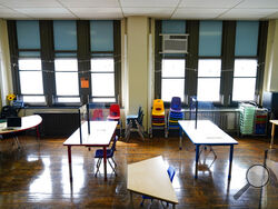 FILE - Desks are spaced apart ahead of planned in-person learning at an elementary school on March 19, 2021, in Philadelphia. Pandemic school disruptions resulted in the largest drop in reading achievement in 30 years, according to newly released national test scores on Thursday, Sept. 1, 2022. The data is from 9-year-olds who took the National Assessment of Educational Progress in 2020 and 2022. (AP Photo/Matt Rourke, File)
