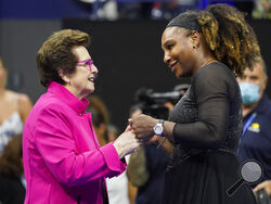 FILE - Billie Jean King, left, meets with Serena Williams, of the United States, after Williams defeated Danka Kovinic, of Montenegro, during the first round of the U.S. Open tennis tournament Aug. 29, 2022, in New York. Pioneering player King, now 78, said Williams gives older fans and players hope and “a pep in their step.” Williams, who plays again on Friday, has hinted that this Open is her last major tournament. (AP Photo/John Minchillo, File)