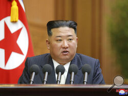 This photo provided by the North Korean government shows North Korean leader Kim Jong Un delivers a speech during a parliament in Pyongyang, North Korea, Sept. 8, 2022. Independent journalists were not given access to cover the event depicted in this image distributed by the North Korean government. The content of this image is as provided and cannot be independently verified. Korean language watermark on image as provided by source reads: "KCNA" which is the abbreviation for Korean Central News Agency. (Ko