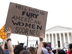 FILE - People protest following the Supreme Court's decision to overturn Roe v. Wade in Washington, June 24, 2022. Democrats are pumping an unprecedented amount of money into advertising related to abortion rights, underscoring how central the message is to the party in the final weeks before the November midterm elections. (AP Photo/Jacquelyn Martin, File)