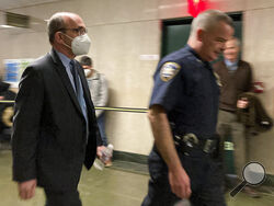 FILE - Donald Bender, left, a former accountant for Donald Trump, arrives at Manhattan criminal court, Nov. 21, 2022, in New York. There was talk of impeachment at the Trump Organization’s criminal tax fraud trial. But the subject was not former President Donald Trump, who was impeached twice. Instead, the question arose as to whether lawyers for his company were angling on Monday, Nov. 28, 2022 to impeach their own witness, longtime Trump accountant Donald Bender. (AP Photo/Michael Sisak)