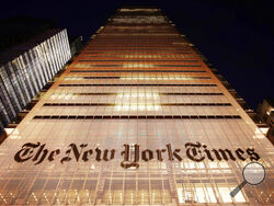 FILE - The New York Times building is shown on Oct. 21, 2009, in New York. The New York Times is bracing for a 24-hour walkout Thursday, Dec. 8, 2022, by hundreds of journalists and other employees, in what would be the first strike of its kind at the newspaper in more than 40 years. (AP Photo/Mark Lennihan, File)