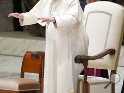 Pope Francis arrives for an audience with Vatican's employees in the Paul VI Hall, at the Vatican, Thursday, Dec. 22, 2022. (AP Photo/Andrew Medichini)