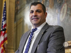 (AP Photo/Matt Smith) Pennsylvania Speaker of the House Mark Rozzi is photographed at the speaker's podium, Tuesday, Jan. 3, at the state Capitol in Harrisburg.