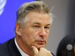 FILE - Actor Alec Baldwin attends a news conference at United Nations headquarters, on Sept. 21, 2015. A Santa Fe district attorney is prepared to announce whether to press charges in the fatal 2021 film-set shooting of a cinematographer by actor Baldwin during a rehearsal on the set of the Western movie “Rust.” Santa Fe District Attorney Mary Carmack-Altwies said a decision will be announced Thursday morning, Jan. 19, 2022, in a statement and on social media platforms. (AP Photo/Seth Wenig, File)