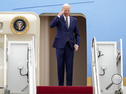 President Joe Biden returns a salute as he boards Air Force One at Andrews Air Force Base, Md., Thursday, Jan. 19, 2023, en route to California. (AP Photo/Jess Rapfogel)