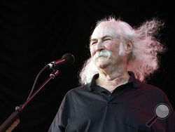 FILE - Musician David Crosby performs during a benefit concert for the City Parks Foundation at Central Park SummerStage, on July 29, 2008, in New York. Crosby, the brash rock musician who evolved from a baby-faced harmony singer with the Byrds to a mustachioed hippie superstar and an ongoing troubadour in Crosby, Stills, Nash & (sometimes) Young, has died at age 81.
