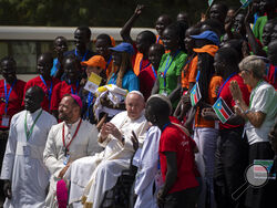 Pope Francis meets with a group of the Catholic faithful from the town of Rumbek, who had walked for more than a week to reach the capital, after he addressed clergy at the St. Theresa Cathedral in Juba, South Sudan Saturday, Feb. 4, 2023. Pope Francis is in South Sudan on the second leg of a six-day trip that started in Congo, hoping to bring comfort and encouragement to two countries that have been riven by poverty, conflicts and what he calls a "colonialist mentality" that has exploited Africa for centur
