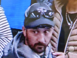 This airport surveillance camera image released in an FBI affidavit shows alleged suspect Marc Muffley at Lehigh Valley International Airport in Allentown, Pa., on Monday, Feb. 27, 2023. Muffley was arrested Monday after an explosive was found in a bag checked onto a Florida-bound flight, federal authorities said. (FBI via AP)