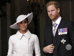 FILE - Prince Harry and Meghan Markle, Duke and Duchess of Sussex leave after a service of thanksgiving for the reign of Queen Elizabeth II at St Paul's Cathedral in London, Friday, June 3, 2022 on the second of four days of celebrations to mark the Platinum Jubilee. Prince Harry and his wife Meghan announced Wednesday, March 8, 2023 that their daughter had been christened in a private ceremony in California, publicly calling her a princess and revealing for the first time that they will use royal titles fo