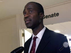 FILE - Dr. Joseph Ladapo speaks with reporters after the Florida Senate confirmed his appointment as the state's surgeon general on Feb. 23, 2022, in Tallahassee, Fla. U.S. health agencies have sent a letter to Florida's surgeon general, warning him that his claims about COVID-19 risks are harmful to the public. The letter from the U.S. Food and Drug Administration and the Centers for Disease Control and Prevention was sent to Ladapo on Friday, March 10, 2023.(AP Photo/Brendan Farrington, File)