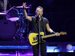 FILE - Singer Bruce Springsteen and the E Street Band perform during their 2023 tour on Feb. 1, 2023, at Amalie Arena in Tampa, Fla. Springsteen’s planned performance Tuesday, March 14, in Albany, N.Y., has become the third concert in a week postponed by the New Jersey rocker due to illness, a month into his first major tour in six years. (AP Photo/Chris O'Meara, File)