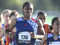 FILE - South African long distance athlete Caster Semenya on her way to winning the 5,000 meters at the South African national championships in Pretoria, South Africa, Thursday, April 15, 2021. Track and field banned transgender athletes from international competition Thursday, March 23, 2023, while adopting new regulations that could keep Caster Semenya and other athletes with differences in sex development from competing. (AP Photo/Christiaan Kotze, File)