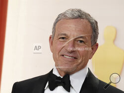 FILE - Bob Iger arrives at the Oscars on March 12, 2023, at the Dolby Theatre in Los Angeles. Disney CEO Iger on Monday, April 3, called efforts by Florida Gov. Ron DeSantis and the Republican-controlled Florida Legislature to retaliate against the company for its policy positions as not only “anti-business but anti-Florida.” (Photo by Jordan Strauss/Invision/AP, File)