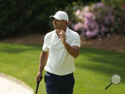 Brooks Koepka waves after his putt on the 13th hole during the second round of the Masters golf tournament at Augusta National Golf Club on Friday, April 7, 2023, in Augusta, Ga. (AP Photo/Charlie Riedel)
