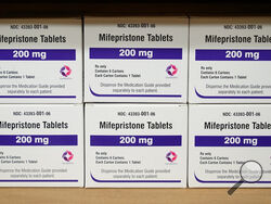 FILE - Boxes of the drug mifepristone sit on a shelf at the West Alabama Women's Center in Tuscaloosa, Ala., March 16, 2022. A federal judge in Texas on Friday, April 7, 2023, ordered a hold on the U.S. approval of the abortion medication mifepristone, throwing into question access to the nation’s most common method of abortion in a ruling that waved aside decades of scientific approval. Federal lawyers representing the FDA are expected to swiftly appeal the ruling. (AP Photo/Allen G. Breed, File)