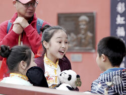 Students from the Tennessee Happy Kung Fu School play during a farewell party for Ya Ya, a Giant Panda at the Memphis Zoo Saturday, April 8, 2023, in Memphis, Tenn. (AP Photo/Karen Pulfer Focht)
