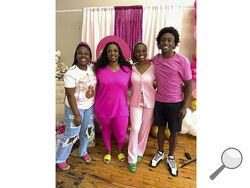 This undated photo provided by the family of Phil Dowdell shows from left, Zaniriah Dowdell, Latonya Allen, Alexis Dowdell and Phil Dowdell. Phil Dowdell was one of four young people killed when a shooting broke out at a Sweet 16 birthday party in Dadeville, Ala., on April 15, 2023. Dowdell was headed to Jacksonville State University in the fall where he planned to play football. (Family of Phil Dowdell via AP)