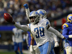 FILE - Detroit Lions defensive back C.J. Moore (38), on special teams, reacts after running out of bounds on a fake punt during the second half of an NFL football game against the Los Angeles Rams Sunday, Oct. 24, 2021, in Inglewood, Calif. The NFL has suspended five players for violating the league’s gambling policy on Friday, April 21, 2023. Detroit Lions wide receiver Quintez Cephus and safety C.J. Moore and Washington Commanders defensive end Shaka Toney were suspended indefinitely, while Lions wide rec