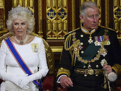 FILE - Britain's Prince Charles, right, and Camilla, the Duchess of Cornwall, listen as Britain's Queen Elizabeth II delivers the Queen's Speech, in the House of Lords, during the State Opening of Parliament, at the Palace of Westminster in London, Wednesday, June 4, 2014. Britain's queen consort, Camilla, has come a long way. On May 6, she will be crowned alongside her husband and officially take her first turns on the world stage as Queen Camilla. It’s been a remarkable and painstakingly slow transformati