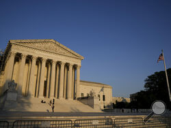 FILE - The Supreme Court is seen on Friday, April 21, 2023, in Washington. The Supreme Court on April 26 will hear the case of a 94-year-old woman who lost her one-bedroom condo over unpaid taxes. (AP Photo/Jacquelyn Martin, File)