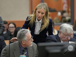 FILE - Gwyneth Paltrow speaks with retired optometrist Terry Sanderson, left, as she walks out of the courtroom following the reading of the verdict in their lawsuit trial, on March 30, 2023, in Park City, Utah. In a judgement published on Saturday, April 29, 2023, the court affirmed the jury's verdict finding Paltrow not at fault for a 2016 collision with Terry Sanderson and said Sanderson would not be required to pay Paltrow's attorney fees and had agreed not to appeal the verdict. (AP Photo/Rick Bowmer, 