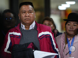 Former Jesuit Pedro Lima stops to talk to journalists after landing at El Alto international airport in El Alto, Bolivia, Monday, May 22, 2023, before traveling to the capital La Paz to make a statement at the public prosecutors office related to a church pedophilia scandal. Lima denounced pedophilia by the late Spanish Jesuit Priest, Alfonso Pedrajas, and was expelled from the Society of Jesus in 2001. (AP Photo/Juan Karita)