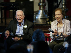 FILE - Former President Jimmy Carter and his wife former first lady Rosalynn Carter sit together during a reception to celebrate their 75th wedding anniversary on July 10, 2021, in Plains, Ga. The Carter family shared news that Rosalynn Carter has dementia, The Carter Center announced Tuesday, May 30, 2023. (AP Photo/John Bazemore, Pool, File)