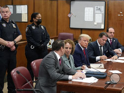 FILE - Former President Donald Trump sits at the defense table with his legal team in a Manhattan court, Tuesday, April 4, 2023, in New York. Trump's lawyers are demanding that the judge in his New York City criminal case step aside, echoing the former president's complaints that he's "a Trump hating-judge" with a family full of "Trump haters." Trump's lawyers said June 2, that Judge Juan Manuel Merchan has shown anti-Trump bias in previous cases related to the businessman-turned-politician. (AP Photo/Seth 