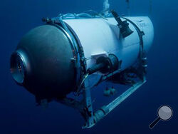 FILE - This undated image provided by OceanGate Expeditions in June 2021 shows the company's Titan submersible. Rescuers are racing against time to find the missing submersible carrying five people, who were reported overdue Sunday night. (OceanGate Expeditions via AP, File)