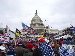 FILE - Rioters loyal to President Donald Trump rally at the U.S. Capitol in Washington on Jan. 6, 2021. Federal prosecutors say Taylor Taranto, 37, who prosecutors say participated in the Jan. 6, 2021 riot at the U.S. Capitol and arrested last week near the home of former President Barack Obama, told followers on his YouTube live stream that he was looking to get a “good angle on a shot” and that he was trying to locate the “tunnels underneath their houses” shortly before he was taken into custody by the Se