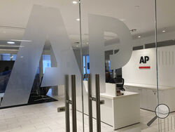 FILE - The Associated Press logo is shown at the entrance to the news organization's office in New York on Thursday, July 13, 2023. The Associated Press has issued guidelines for its journalists on use of artificial intelligence, saying the tool cannot be used to create publishable content and images for the news service. (AP Photo/Aaron Jackson, File