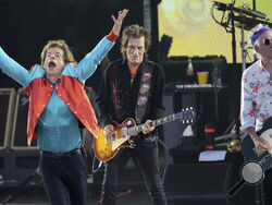 FILE - Mick Jagger, left, Ronnie Wood, center, and Keith Richards, right, of the band "The Rolling Stones," perform onstage during the last concert of their "Sixty" European tour in Berlin, Germany, Aug. 3, 2022. On Monday, Sept. 4, 2023, the Rolling Stones announced they will release their first album of original material in 18 years. Titled “Hackney Diamonds,” the legendary rock band will reveal the full details on Wednesday, Sept. 6, at an event in Hackney in East London. (AP Photo/Michael Sohn, File)