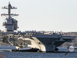FILE - The USS Gerald R. Ford, arrives in Halifax on Oct. 28, 2022. Within hours of the horrific attack by Hamas, the U.S. began moving warships and aircraft to the region to be ready to provide Israel with whatever it needs to respond.(Andrew Vaughan/The Canadian Press via AP, File)