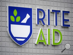 FILE - This photo shows a sign of Rite Aid on its store in Pittsburgh on Jan. 23, 2023. Rite Aid, a major U.S. pharmacy chain, said Sunday, Oct. 15, that it has filed for bankruptcy as part of its effort to restructure its finances. (AP Photo/Gene J. Puskar, File)