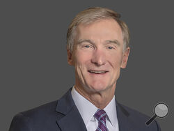 This undated photo provided by Leidos shows that company's retired CEO Roger Krone, who was named Friday, Nov. 3, 2023, as the new president of the Boy Scouts of America. Krone, a former Eagle Scout, says he plans to reverse the trend of declining membership and improve safety programs as the organization emerges from bankruptcy following a sexual abuse scandal. (Jay Townsend/Leidos via AP)