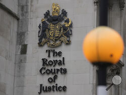 A general view of the Royal Courts of Justice where Justice Timothy Fancourt gave his ruling in the Prince Harry phone hacking lawsuit in London, Friday, Dec. 15, 2023. Prince Harry has won his phone hacking lawsuit against the publisher of the Daily Mirror and was awarded over 140,000 pounds ($180,000) in the first of his several lawsuits against the tabloids to go to trial. Fancourt found on Friday that phone hacking was "widespread and habitual" at Mirror Group Newspapers over many years. (AP Photo/Kin C