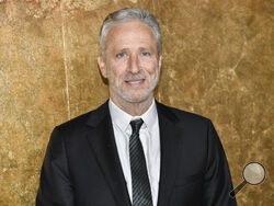 FILE - Jon Stewart attends The Albies hosted by the Clooney Foundation for Justice at the New York Public Library in New York on Sept. 28, 2023. Stewart is rewinding the clock, returning to “The Daily Show” as an occasional host and executive producing through the 2024 U.S. elections cycle. Comedy Central on Wednesday said Stewart will host the topical TV show, the perch he ruled for 16 years starting in 1999, every Monday starting Feb. 12. (Photo by Evan Agostini/Invision/AP, File)